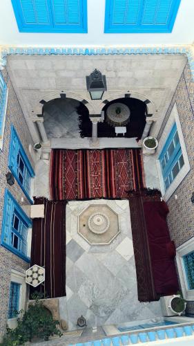 an overhead view of a building with a large window at Dar Ben Jemia- Sidi Bou Saïd in Sidi Bou Saïd