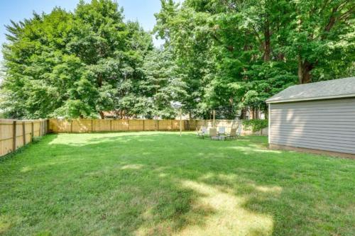 a yard with a fence and a shed at Owls Nest Cozy Westfield Home with Fire Pit in Westfield
