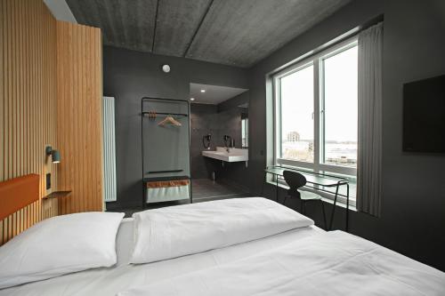 Postel nebo postele na pokoji v ubytování Four Points Flex by Sheraton Hillerød
