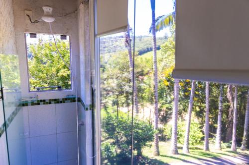 Κήπος έξω από το Casa de Campo LEÃO BAIO - Antônio Carlos SC