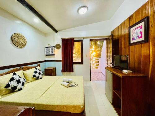 TV a/nebo společenská místnost v ubytování Casa Fiesta Resort