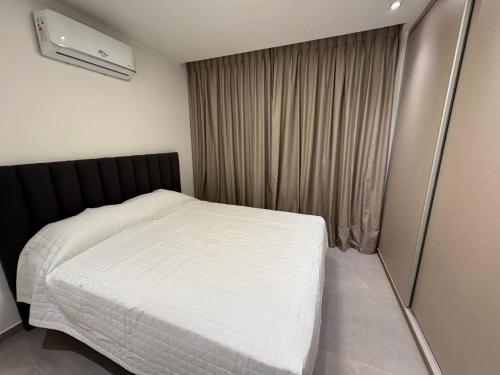 Katil atau katil-katil dalam bilik di Departamento de 150 m2 -Second Home- en Edificio Marwa, Posadas