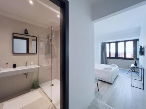 a bathroom with a shower and a sink and a toilet at b&b boutique four rooms bari in Bari