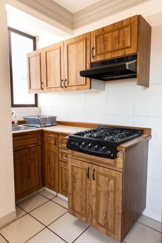 Kuchyň nebo kuchyňský kout v ubytování Lofts Oaxaca