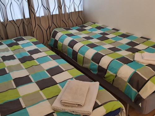Postel nebo postele na pokoji v ubytování apartment hotel