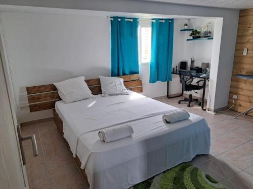 Llit o llits en una habitació de Mô Kay