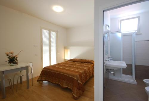 A bathroom at Amadei Hotel Figaro & Apartments