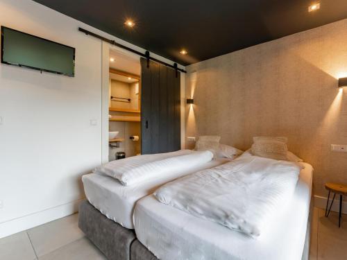 Katil atau katil-katil dalam bilik di Alpinn Wellness 1