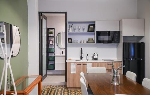 Kuchyň nebo kuchyňský kout v ubytování Patio Elba Boutique Hotel