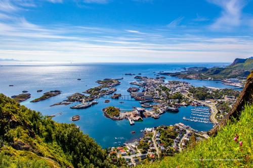 an aerial view of a harbor in the ocean at Nordis Hotel Lofoten in Svolvær