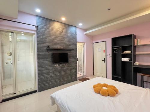 Katil atau katil-katil dalam bilik di Kinmen Harved B&B