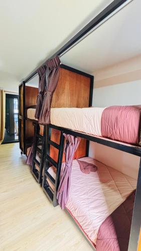 Postel nebo postele na pokoji v ubytování Brightstar Hostel