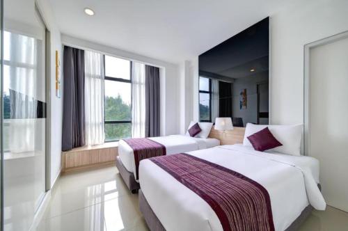 The Ascent Suites Genting Highlandsにあるベッド