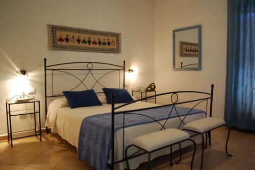 Tempat tidur dalam kamar di Vecchio Stazzo
