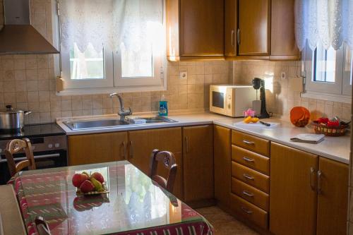 Una cocina o zona de cocina en Triangle Park A2