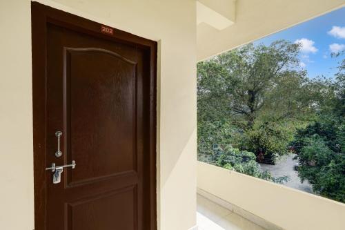 Fotografie z fotogalerie ubytování Hotel 83052 O Souparnika Residency v destinaci Pathanāmthitta