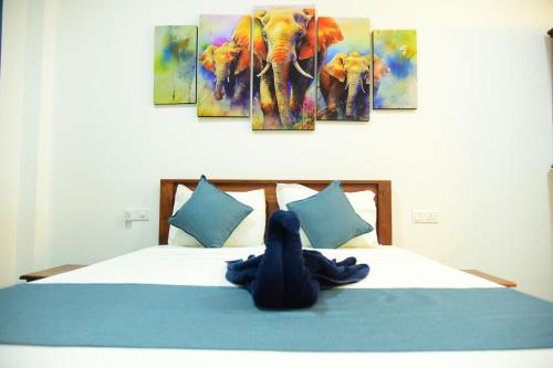 Katil atau katil-katil dalam bilik di Di Sicuro Tourist Inn