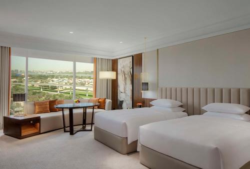 Кровать или кровати в номере Grand Hyatt Dubai