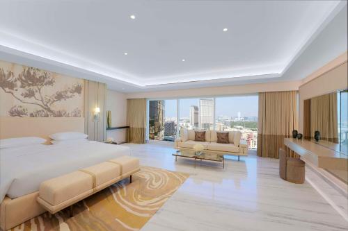 Кровать или кровати в номере Grand Hyatt Dubai