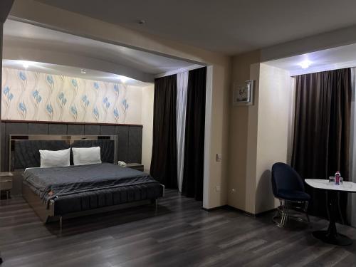 Кровать или кровати в номере AEF Hotel