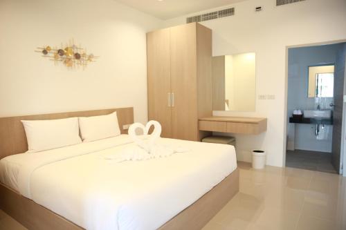 Letto o letti in una camera di Shangrilah Bungalow