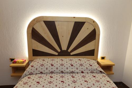 Postel nebo postele na pokoji v ubytování SUITE DEL VILLAGGIO