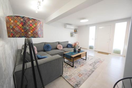 Zona de estar de Cozy Like Home