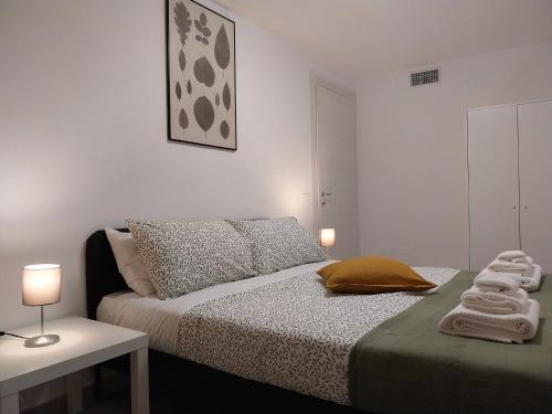 Ένα ή περισσότερα κρεβάτια σε δωμάτιο στο Residence La Vela 2