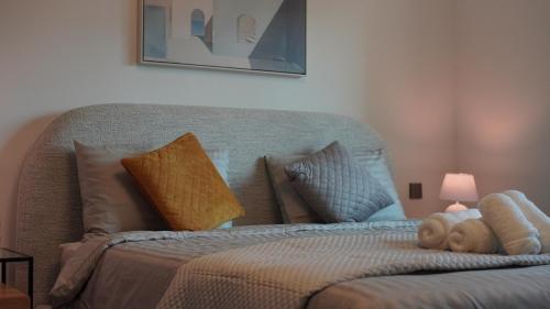 Ένα ή περισσότερα κρεβάτια σε δωμάτιο στο 2 Bedroom beach front apartment
