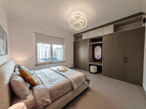 Ένα ή περισσότερα κρεβάτια σε δωμάτιο στο 2 Bedroom beach front apartment