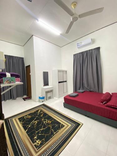 Ένα ή περισσότερα κρεβάτια σε δωμάτιο στο Homestay Nimaza2
