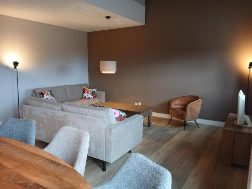 Posezení v ubytování Raafjeshof - Vakantiewoning