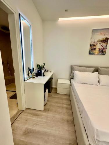 Postel nebo postele na pokoji v ubytování Dadu Rooms