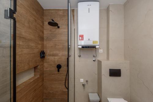 a bathroom with a toilet and a sink at Top Central 6 Apartments in Belgrade