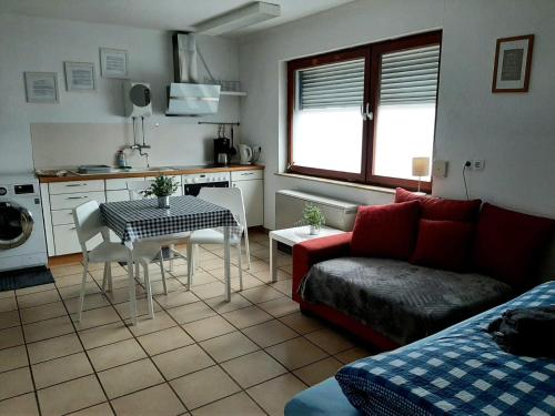 Kuchyň nebo kuchyňský kout v ubytování Fiore Gästezimmer