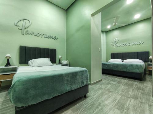 Postel nebo postele na pokoji v ubytování Hotel Panorama 1947