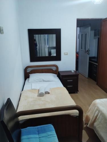 Una cama o camas en una habitación de Petrit apartament