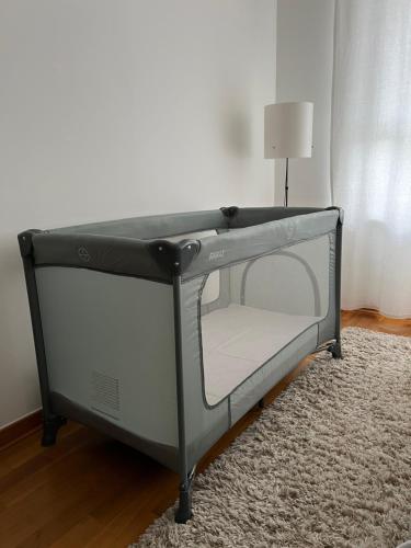 a bunk bed in a room with a carpet at Zen Suite in Novi Beograd