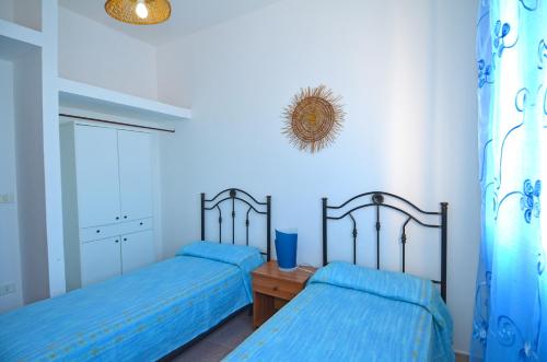 Posteľ alebo postele v izbe v ubytovaní Casa Orizzonte
