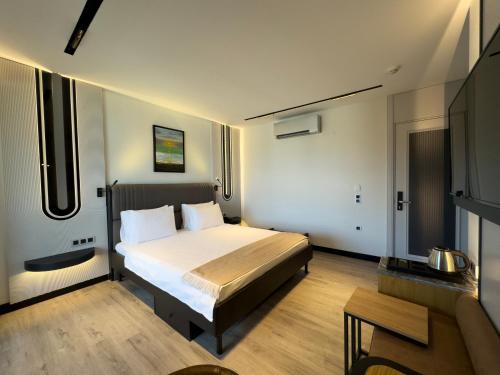 Кровать или кровати в номере Villa Business Hotel Istanbul Airport