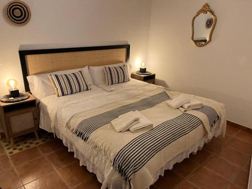 Ένα ή περισσότερα κρεβάτια σε δωμάτιο στο Ulls del Priorat