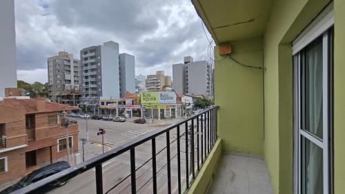 a balcony with a view of a city street at Vida, hotel de playa in Puerto Madryn