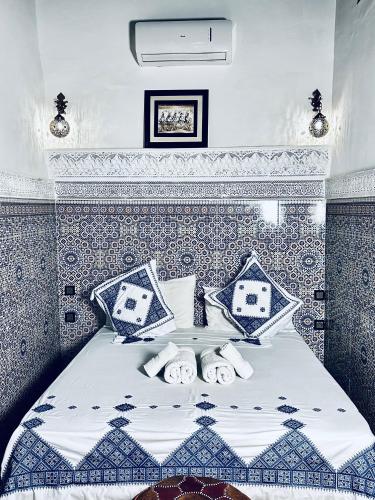 Cama o camas de una habitación en Riad Le Petit Patrimoine De Fés