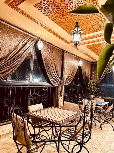 Zona de estar de Riad Le Petit Patrimoine De Fés