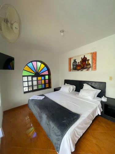 Ένα ή περισσότερα κρεβάτια σε δωμάτιο στο Hotel Boutique Las Isabelinas