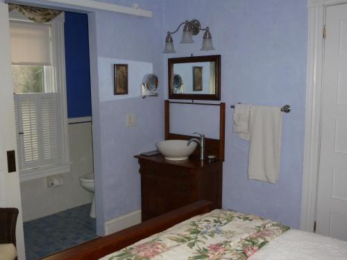 Postel nebo postele na pokoji v ubytování Back INN Time B&B