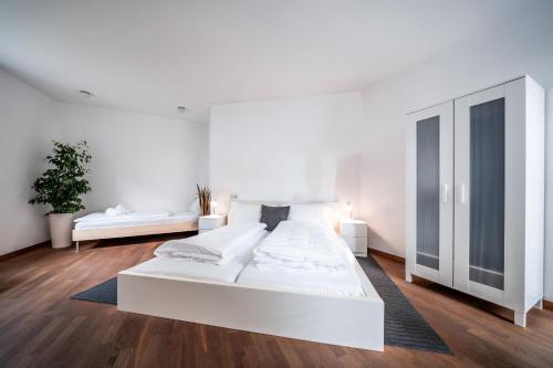 Postel nebo postele na pokoji v ubytování Apartment Das Goldgassl