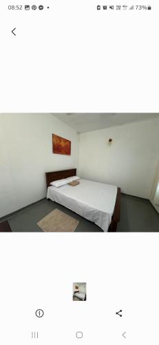 a small bedroom with a bed in a room at Two room flat in colombo 5 in Narahenpita