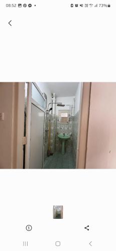a bathroom with a green toilet in a room at Two room flat in colombo 5 in Narahenpita