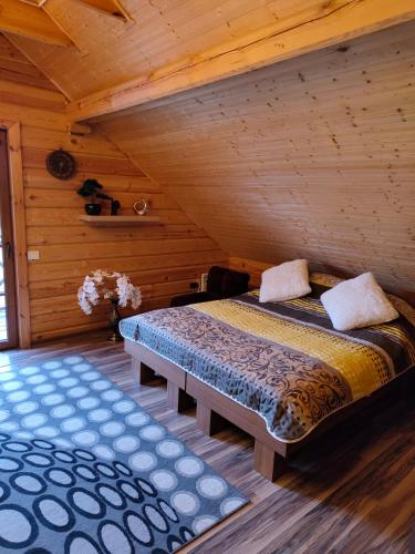 Ένα ή περισσότερα κρεβάτια σε δωμάτιο στο Lake House Villa pas Eugenija